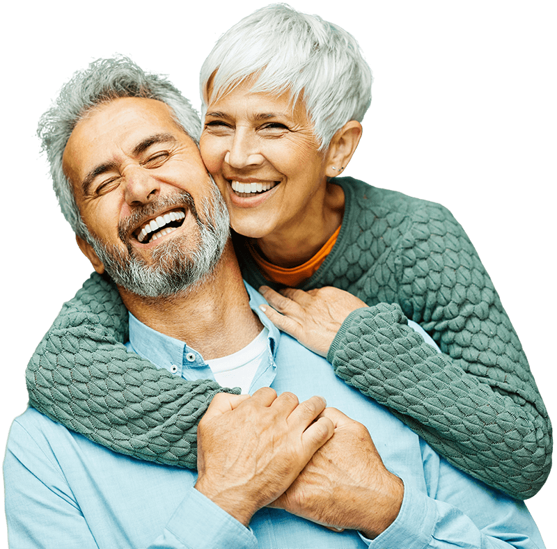 Elderly couple smiling with dentures